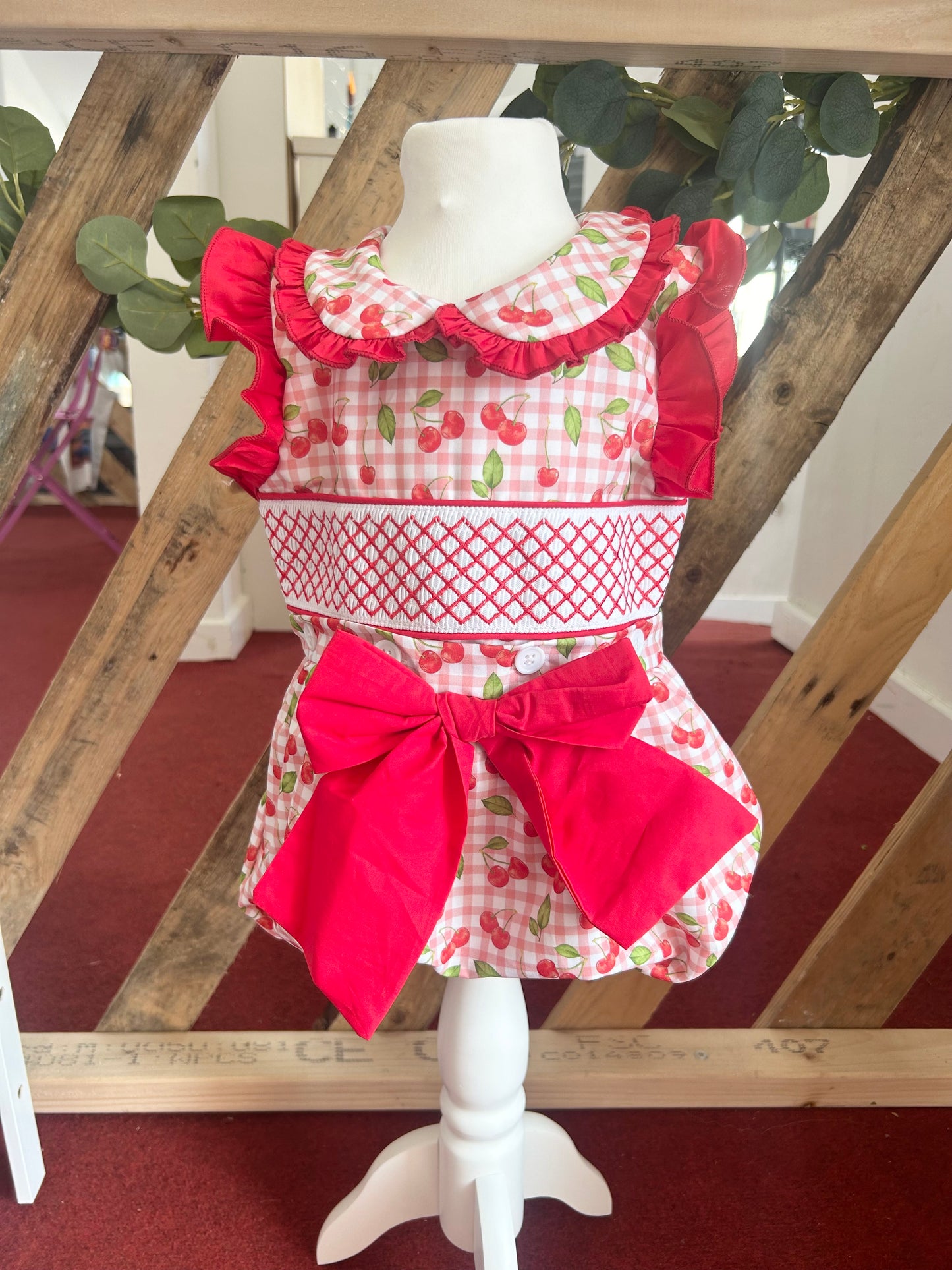 Cherry smocked romper - in stock