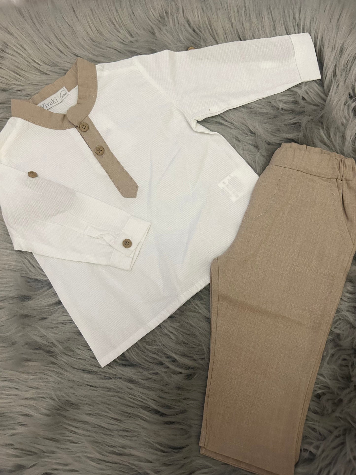 Shirt & brown trousers