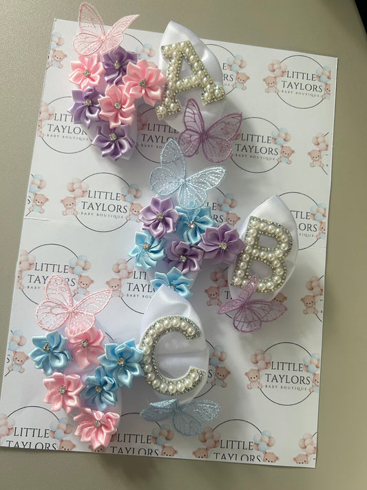 Initial flower bow